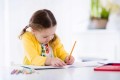 Literki 1-klasisty książeczka edukacyjna ćwiczenia w pisaniu + naklejki
