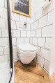 Miska ustępowa wc wisząca bezkołnierzowa z deską wolnoopadającą Biała