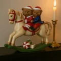 Figurka świąteczna miś na bujanym koniu żywica 33,5cm