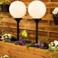 Lampka solarna ogrodowa wbijana kula zimna biel czarna 73cm 1szt